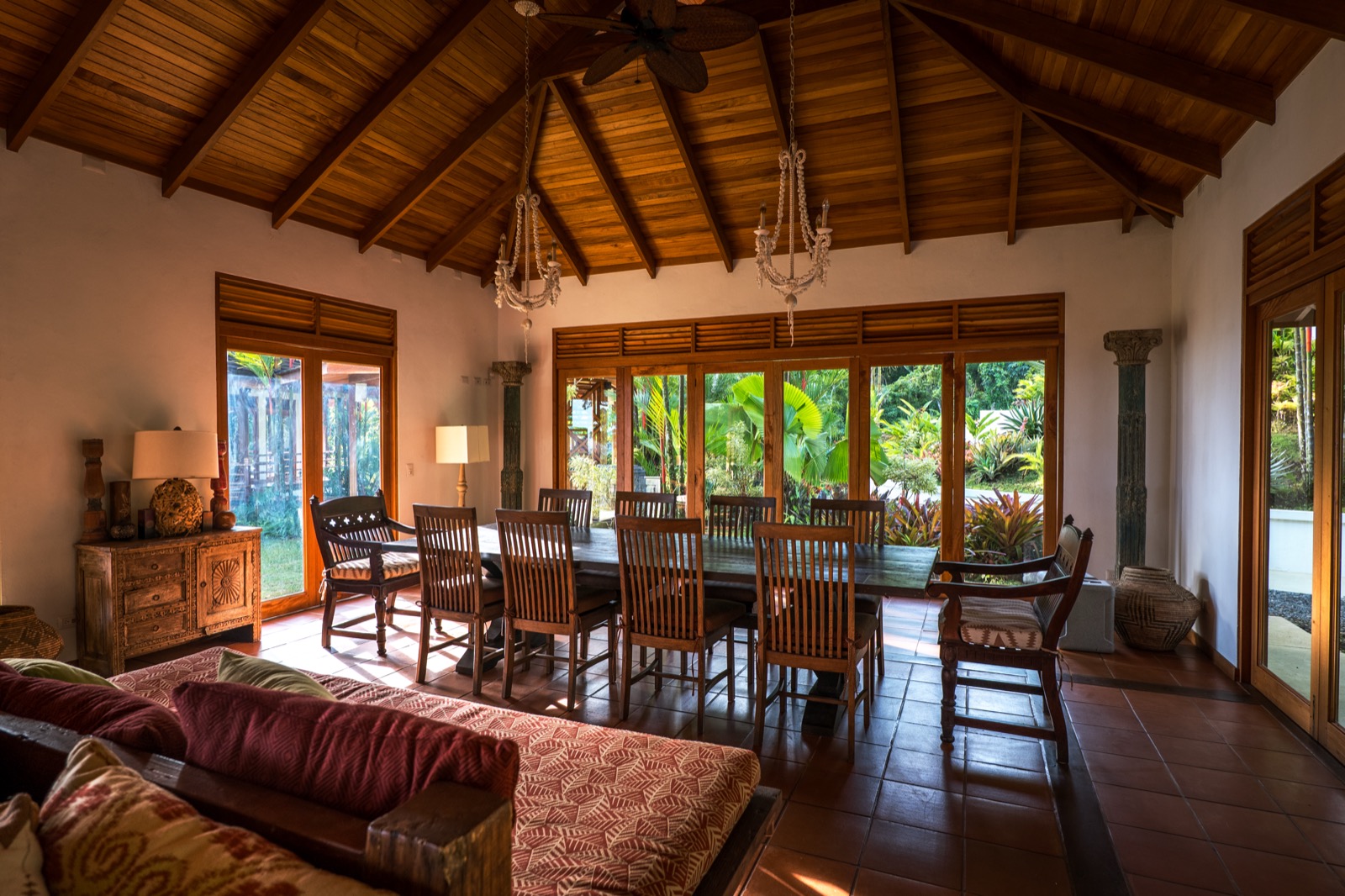 Grand dining room with vaulted wood ceiling and chandeliers